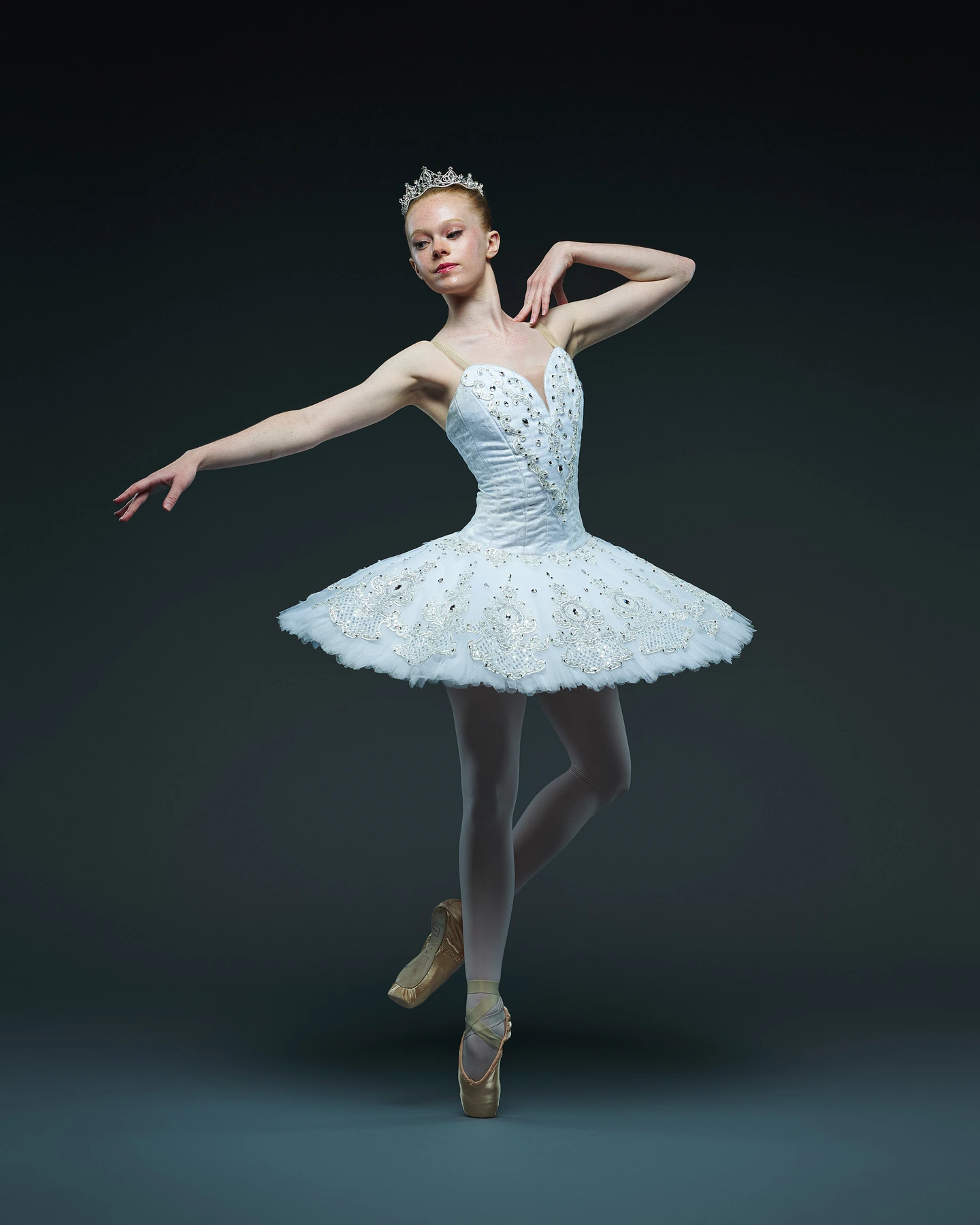 Ballet dancer wearing an embellished pale blue tutu and silver tiara